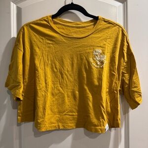 Walk In Love Mustard Yellow Crop Tee with Floral Graphic